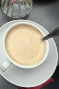 What is the price of a regular cappuccino?