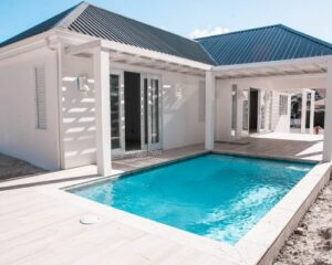 In Jolly Harbour, what’s the cost per square foot for homes with private pools?
